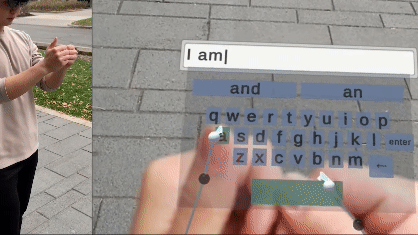 Moving image of fingers typing on a virtual keyboard.