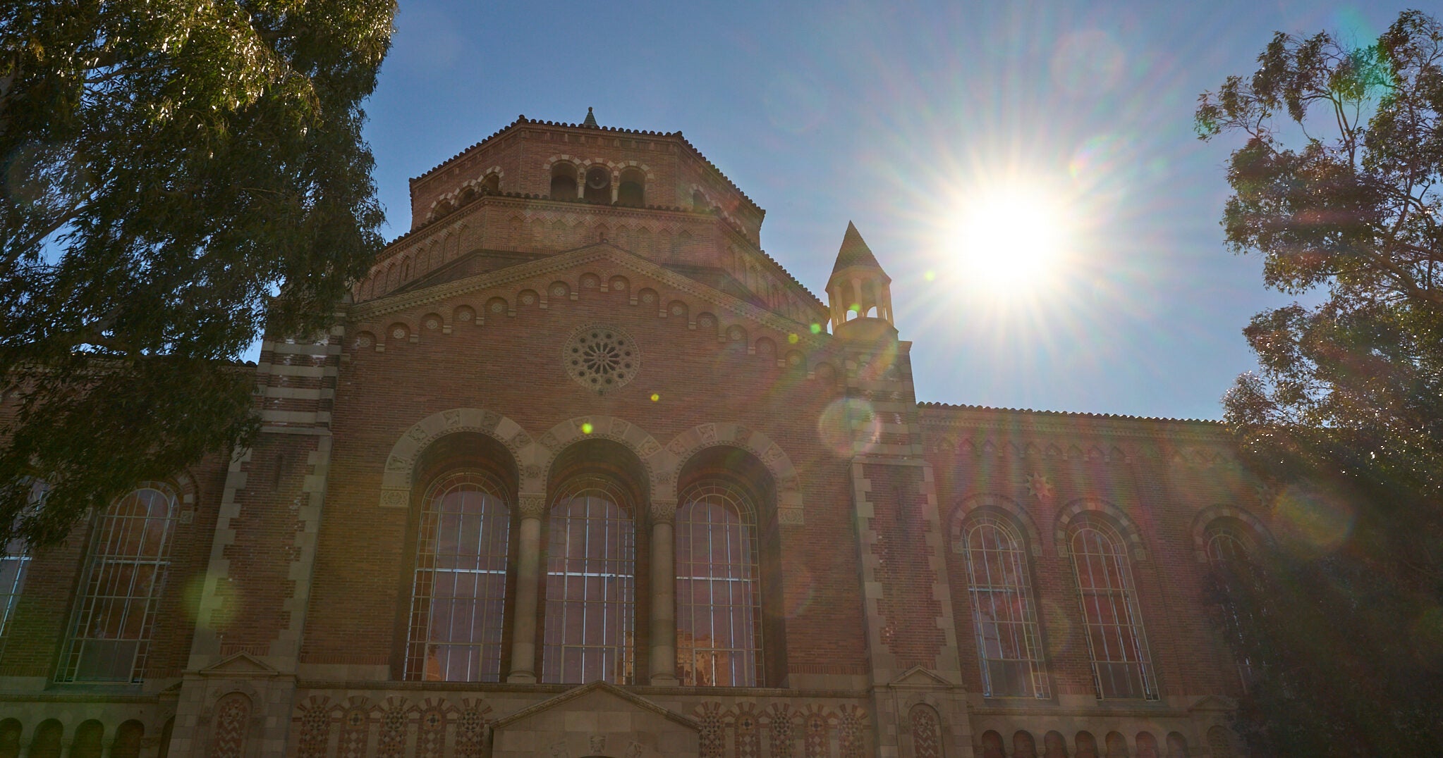 sun hsining over ucla powell library