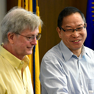 Genomics Day organizer Kevin Gerrish, Ph.D., left, and Jason Li, Ph.D., director of the Integrative Bioinformatics Support Group