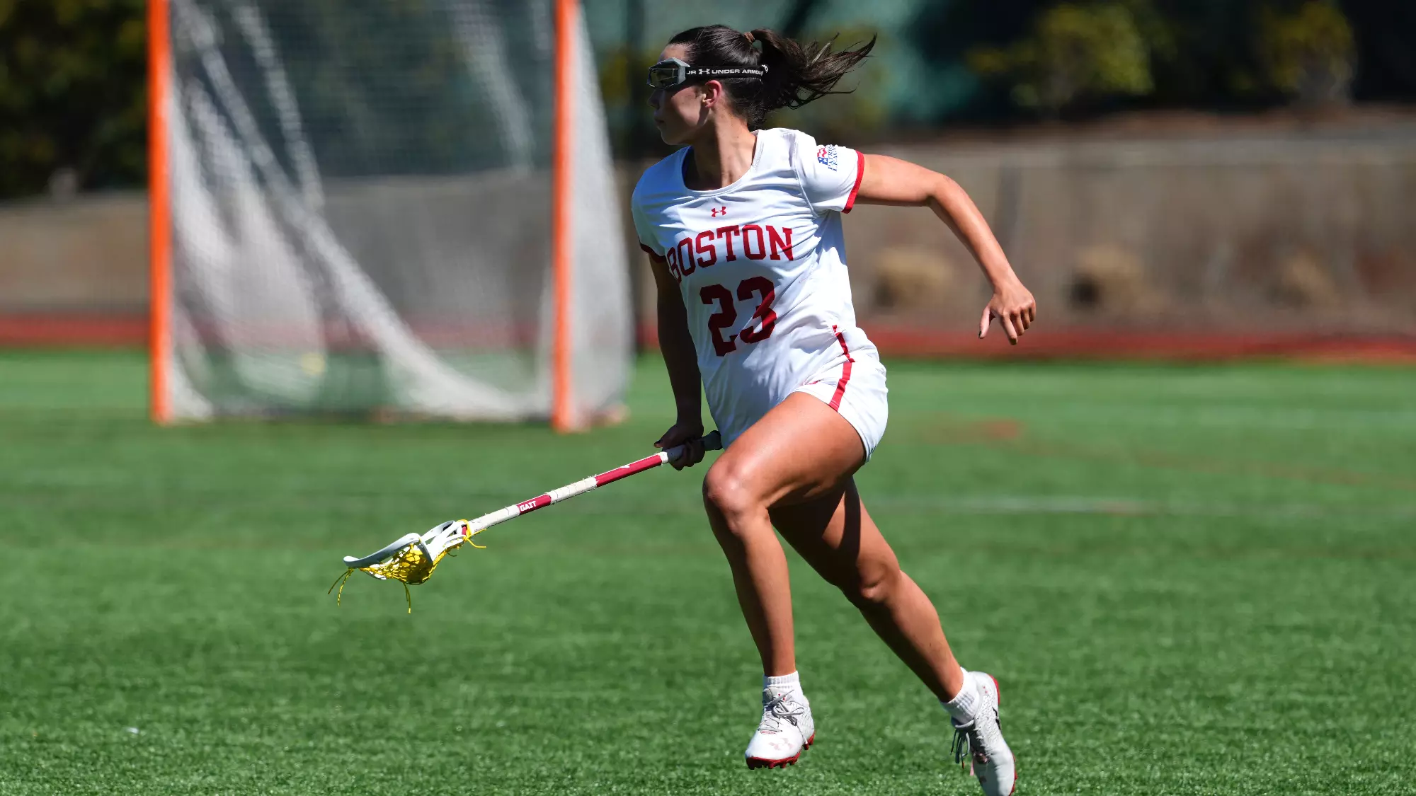 Hannah Tillier runs with the ball