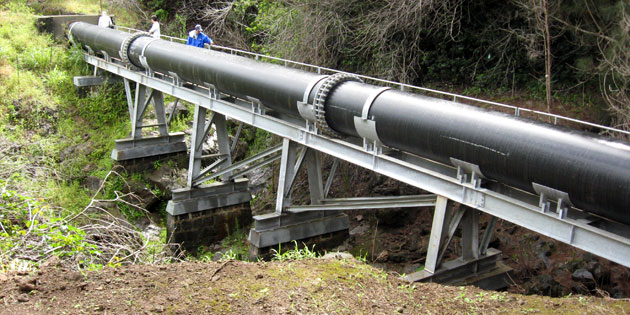 Photo of crew repairing irrigation ditch