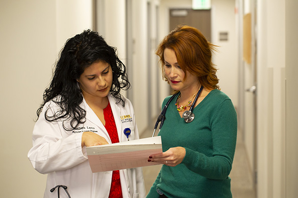 P.A. student with preceptor and patient