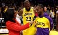 NBA on TNT sideline reporter Taylor Rooks interviews Los Angeles Lakers forward LeBron James (23) and guard Bronny James (9) after they defeated the Minnesota Timberwolves on Tuesday at Crypto.com Arena. 