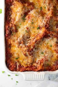 This homemade gluten-free lasagna recipe is a classic that every gluten-free cook should have in their rotation. It's EASY to make! A delicious gluten-free holiday dinner or meal for any time of year.