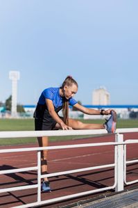 Download this Free Photo about Young sportive at stadium stretching, and discover more than 1 Million Professional Stock Photos on Freepik