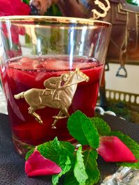 Aperitif  : Rose' Sangria (Barefoot Contessa), Glasses with gold rims purchased at Homegoods and race horse appliques from Esty are embossed metal that I had to bend and then use glass glue to attach.