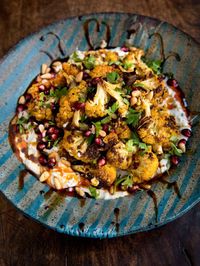 Roasted Cauliflower with Herbed Yogurt, Pomegranate Molasses and Smoked Paprika Oil - WILD GREENS & SARDINES