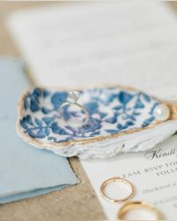 my mom hand made each of our guests an oyster shell to take as a thank you for attending. they all varied, for each guest and were such a special touch for our coastal south carolina wedding