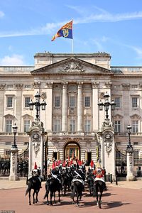 Members of the Household Cavalry arrive at Buckingham Palace ahead of the State Opening of Parliament