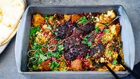 Persian lamb kofta traybake with torn falafel, dates and grains Recipe | Good Food