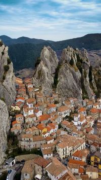 471K views · 45K likes | Karolis | Travel&Hotel Photographer on Instagram: "🏘️ Living on the edge 🇮🇹 Perched on rocky cliffs, Pietrapertosa captivates with its dramatic setting. This ancient village, part of the Dolomiti Lucane, offers breathtaking views and a sense of timelessness. 📍🌐 Pietrapertosa, Basilicata, Italy 🏰🗺️ #Pietrapertosa #Basilicata #Italy #Cliffside #DolomitiLucane #ExploreBasilicata #drone #Italia #rocks"