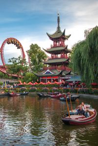 Copenhagen / Denmark / Tivoli Gardens / One of the oldest and most visited theme parks in the world operating since 1843. It is definitely worth seeing both by day and after dusk when it is all lit up. The park boasts one of the oldest wooden roller coasters in the world called Rutschebanen, which was built back in 1914.