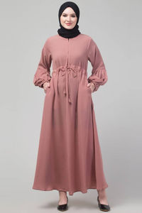 Celebrate Eid in style with our elegant Mauve Matt Nida Abaya, featuring chic pleated sleeves and an adjustable waist for a flattering silhouette. This designer abaya, paired with a black hijab, offers the perfect blend of comfort and sophistication, ideal for festive gatherings and casual outings. Shop now and elevate your Eid wardrobe! #EidAbaya #MauveAbaya #ModestFashion #AbayaStyle #EidOutfit #Mirraw