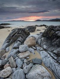 size: 24x18in Photographic Print: Taransay at Sunset from the Rocky Shore at Scarista, Isle of Harris, Outer Hebrides, Scotland, UK by Lee Frost :