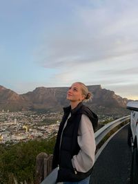 summer, cape town, stellenbosh, outfit, table mountain, winter outfit, signal hill, sleevless puffer, slick back bun, city, nigh time, sunset, city veiw