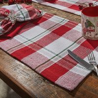 Elevate your dining experience this winter with our enchanting Winter Magic Placemat Set of 4. This delightful set features a charming plaid design that prominently showcases vibrant reds, creamy whites, and subtle green stripes, evoking a cozy and festive atmosphere perfect for holiday gatherings and family meals alike. Crafted from textured cotton, these placemats not only bring a touch of freshness and warmth to your table setting, but they are also durable and absorbent, making them an essen