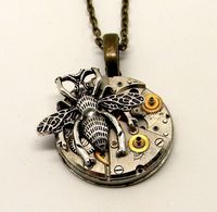 Steampunk jewelry. Steampunk watch with bee pendant necklace.