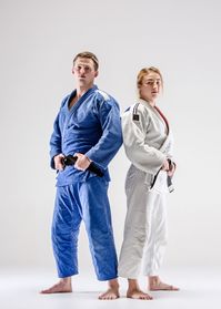 The two judokas fighters posing on gray. Download it at freepik.com! #Freepik #freephoto #fitness #gym #sports #exercise