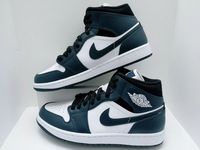 NIKE Air Jordan 1 Mid-Top - Navy Blue and White Sneakers -  Experience the ultimate blend of style, comfort, and performance with Air Jordan sneakers. Engineered for basketball legends and sneaker enthusiasts alike, Air Jordans are crafted