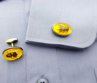 Tateossian Bumble Bee cufflinks are simply stunning. Set in resin, they are made from real bees. Gunmental finish for the metal parts and made in London. $250 on our website.