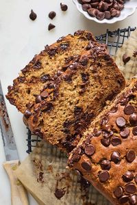 This Chocolate Chip Banana Bread recipe is loaded with ripe bananas and melty chocolate with a moist tender crumb! Perfect for a snack or breakfast. #bread #chocolatechips #chocolate #bananabread #chocolatechipbananabread