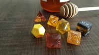 A new dice palette!This one is for my Firbolg druid, named Honey Bee. She was blessed by the Bear King (Archfey from Kobold Press’ Tome of Beast) and thus has an affinity for bees. I wanted a palette with a lot of rich golds and ambers and lots of...