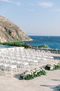 " ...From a ceremonial arch filled to the brim with luscioius white florals, to an exclusive set of tableware ordered to measure just for our beloved bride and groom, and from their greenery and white blooms laden details to their poolside reception everything worked to the finest seam! "