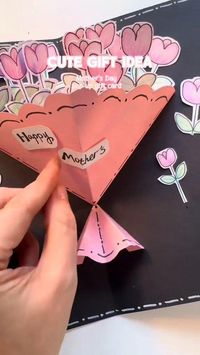 Cute gift idea: A tulip flower pop-up card for your mom, she will definitely be happy. Please pause to see the size of the card being made#cutegiftideas #easytomake #paperflower #boutique #mothersday #popupcard #tulips #DIY Pearbee