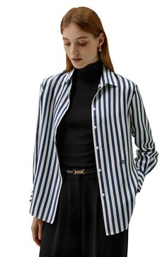 The contrast of classic bold stripes brings out the beauty of a vivid and standout look, showing a more premium fashion taste. The regular fit piece is perfect for "everyday" looks, great with pants and skirts for any work or casual occasions. 16 Momme printed silk twill Classic bold strip Regular Fit Classic Blue Horizontal Stripe Tops, Elegant Button-up Shirt With Vertical Stripes, Classic Button-up Shirt With Contrast Stripes, Classic Button-up Tops With Contrast Stripes, Blue Horizontal Stripe Long Sleeve Top, Plain White T Shirt, Stripe Silk, Silk Material, Bold Stripes