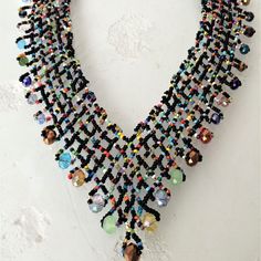 Artisan Czech Glass Bead 20" Long Fashion Statement "V" Style Necklace Black Multi-Color Glass Beads Necklace In Shimmering Beads & Iridescent Silver Beads Easy To Open/Close Magnetic Clasp An Incredible "Statement" Necklace One Of A Kind Necklace Handcrafted/No Two Are Exactly Alike Would Be Perfect For A Get-A-Way Destination Dress! This Is A Gorgeous Necklace Is Made In Guatemala Using Artisan Crafted Czech Glass Beads. Czech Glass Beads Are Know World Wide For Their Quality, Vibrant Color Black Crystal Beaded Necklace With Round Beads, Bohemian Black Crystal Necklace For Party, Black Crystal Necklaces With Colorful Beads For Jewelry Making, Adjustable Black Crystal Necklaces With Colorful Beads, Adjustable Black Crystal Necklace With Colorful Beads, Black Crystal Beaded Necklaces For Gift, Black Crystal Beaded Necklace For Gift, Black Crystal Beaded Necklaces For Jewelry Making, Bohemian Black Crystal Necklaces With Round Beads