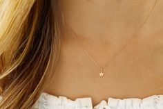 Shine bright like a star with this dainty yet youthful Mini Star Necklace. Made with 14k yellow gold and a tiny diamond, this cute necklace makes a great gift for any occasion. Add some celestial charm to your outfit! Details: 14kyg 1D=.03ct 18" Why we love it: Adorable and timeless layering necklace with the cutest diamond accent. Made in USA Tiny Star Necklace, Tiny Star, Tiny Diamond, Cute Necklace, Layering Necklace, Star Necklace, Shine Bright, Outfit Details, Layered Necklaces