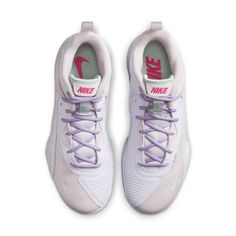 the nike air max 95 is in white and pink with purple laces on the bottom