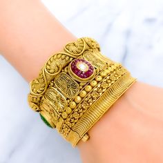 PRODUCT DETAILS Gold Purity(karat): 22k Item Weight(grams): 61.5 Item Finish: Oxidized Stone: Kundan Bangle Size: 2.5 Bangle Opening(diameter): ﻿2.3" Openable: Yes - Screw w/ Hinge Number Of Pieces: 1 Bangle Hand Set 22k Gold Festive Bracelets, 22k Gold Temple Jewelry Bracelets For Festivals, Gold Kundan Fusion Bangle, Hand Set Gold Bracelet Temple Jewelry For Festive Occasions, Festive Hand-set Gold Bracelet In Temple Jewelry Style, Temple Jewelry Style Hand Set Gold Bracelet For Festive, Temple Jewelry Style Gold Bracelet For Festive, Festive Fusion Style Gold Bracelets, 22k Gold Temple Jewelry Bracelets As Gift