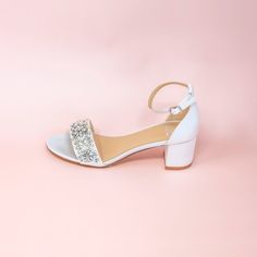 So many of you have been asking for pretty wedding shoes with comfortable block heels... Meet Brielle! Made with amazing pearl & jewel details on the finest ivory satin... Did we mention, Brielle has the most comfortable low block heels! Perfect for modern brides! Also, these wedding shoes with block heels are perfect for outdoor and garden weddings where you won't be worried about heels getting stuck!!! Wedding Shoes Block Heel Style “Brielle” in ivory 2" heel Block heels Adjustable ankle strap Embellished Block Heel Wedding Shoes For Prom, Block Heel Wedding Shoes With Rhinestones For Evening, Embellished Wedding Shoes For Prom With Block Heel, Elegant Wedding Shoes With Rhinestones And Block Heel, Glamorous Low Heel Wedding Guest Shoes, Glamorous Wedding Shoes With Rhinestones And Block Heel, Elegant Pearl Embellished Block Heels, Elegant Open Toe Block Heels For Bridal Shower, Elegant Embellished Block Heels For Formal Occasions