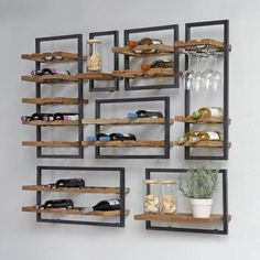 some shelves that have wine glasses and bottles on them