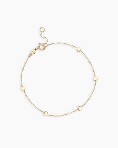 Achieve a truly timeless look with the 14k Gold Heart Bracelet. This beautiful solid gold chain bracelet features dainty heart details, making it the perfect addition to your daily stack. To wear, stack alongside other solid gold or diamond bracelets. More is more! Heart Bracelet in 14k Solid Gold, Women's by gorjana Everyday 14k Gold Bracelet With Heart Charm, Classic Everyday Bracelets With Heart Charm, 14k Gold Bracelet With Heart Charm For Everyday, Classic Everyday Heart Charm Bracelet, Delicate Yellow Gold Heart Bracelet, 14k Gold Heart Bracelet For Everyday, Minimalist 14k Gold Bracelet With Heart Charm, Yellow Gold Heart-shaped Minimalist Bracelet, Delicate Yellow Gold Heart Bracelet With Charm