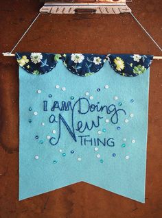 a blue banner that says i am doing a new thing