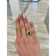 Stunning vivd green emerald of superb color with diamond three stone ring, by Alexander Beverly Hills. 3.15 carats total gemstone weight. 2.53 carat emerald cut emerald, approximately F1/F2. 2 trillion diamonds, 0.62 carats. Approximately G color and VS1/VS2 clarity. Two tone 18-karat white and yellow gold, 4.32 grams, current ring size 6.25. Accommodated with an up-to-date digital appraisal by a GIA G.G. once purchased, upon request. Please contact us with any questions. Thank you.  *Ring will be sent to GIA in the coming weeks. Love this emerald but need personalized customization? Please reach out to us, we will be happy to assist you. Three Stone Emerald Ring, Engagement Ring With Emerald, Diamond And Emerald Ring, Trillion Diamonds, Ring With Emerald, Diamond Three Stone Ring, Emerald And Diamond Ring, 3 Stone Rings, Three Rings