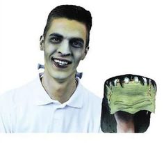 a man is wearing a fake alligator's head and has his mouth painted white