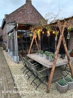 an outdoor dining area with tables and chairs