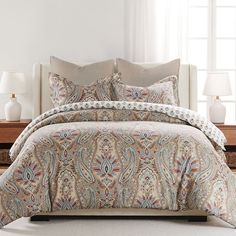 the comforter is neatly made and ready to be used in the bedroom or living room