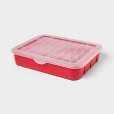 a red and pink plastic box with compartments