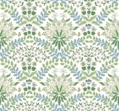 a green and white floral pattern with leaves