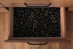 Elevate your space with this breathtaking dark floral contact paper, designed to bring a touch of vintage charm with a modern edge. Featuring intricate botanical vines and delicate flowers set against a bold black background, this peel-and-stick design transforms walls, cabinets, and furniture with ease. Made with high-quality, removable vinyl, it offers a stylish and sophisticated look for renters and homeowners alike. Peel and Stick Contact Paper: Transform with Ease! Upgrade your space effort Peel And Stick Cabinet Covers, Things To Laminate, Kitchen Contact Paper, Contact Paper Cabinets, Wallpaper Drawers, Peel And Stick Countertop, Peel And Stick Contact Paper, Kitchen Liners, Paper Shelf