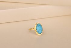 This beautiful Turquoise Ring is the perfect gift for yourself or your loved one. The ring is crafted in 10K, 14K and 18K solid gold, silver and shines with a beautiful turquoise gemstone. This elegant and sleek piece of jewelry makes a lovely addition to any jewelry collection. Details of the product Material: 10K and 14K Solid Gold, Silver Gemstone: Turquoise Gemstone Gemstone Size: 12x16 mm Unique Gift For people whom you love; Mom, Girlfriend, Wife, Fiance, Best Friend; Dainty Gift Idea; Valentine's Day Gift, Birthday Gift, Anniversary Gift, Gift For Engagement or Wedding, Promise Gift, Christmas Gift, Black Friday Gift, Mother's Day Gift, International Women's Day Gift, Memorial Gift. By gifting this elegant product to the most special person in your life, you can make them very happy Elegant Stackable Turquoise Open Ring, Elegant Stackable Open Turquoise Ring, Elegant Turquoise Open Ring For Promise, Elegant Gold Turquoise Round Ring, Gold Turquoise Ring With Bezel Setting For Gift, Gold Turquoise Ring For Gift, Gold Turquoise Ring Gift, Gold Turquoise Ring With Bezel Setting As Gift, 14k Gold Turquoise Gemstone Ring