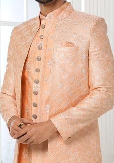 Readymade Art Silk Sherwani, and Jacket. Art Dupion Aligarhi Ready Made Trouser. Resham, Sequences, and Zari Work. Crafted in Chinese Collar Neck, and Full Sleeve. Faux Satin Lining with Plain Work. High-Quality Matching Buttons. Please Note: The footwear shown in the picture is for presentation and photography purpose only. Color: There might be slight color variation due to lightings and flashes while photo shooting. The color may also vary because of different screen resolutions. Wash Care: D Western Party Wear, Suit With Jacket, Goa Wedding, Indo Western Sherwani, Jacket Art, Western Party, Chinese Collar, Readymade Saree, Collar Neck