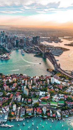 an aerial view of sydney, australia with the harbor and city in the foreground