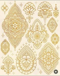 an intricate golden pattern on white paper