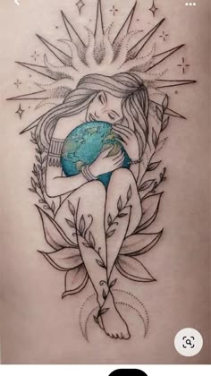 a woman with a globe on her stomach