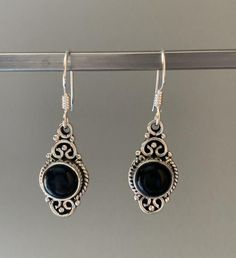 Black onyx earrings, Flowers black onyx earrings Classic Black Pierced Earrings, Black Gemstone Drop Earrings, Classic Black Earrings, Black Enamel Dangle Earrings For Gift, Classic Black Dangle Jewelry, Gift Black Enamel Dangle Earrings, Black Sterling Silver Earrings For Formal Occasions, Black Handmade Earrings For Formal Occasions, Black Jewelry Gift Set With Matching Earrings